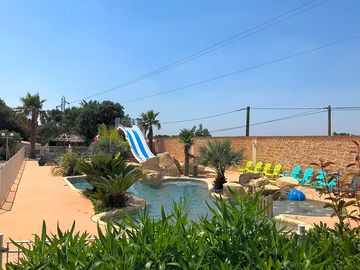 Pool with slides and sun loungers (added by manager 28 oct 2019)
