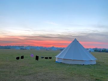 Bell tents at dawn (added by manager 21 jul 2022)