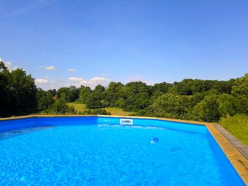 The pool overlooks the fields and woods (added by manager 19 feb 2014)