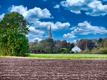 View across the fields at the rear of the site looking at the spire of tydd st mary church. (added by paul_e666706 30 oct 2023)