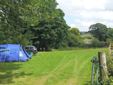 Our pitch with a view of the lake (added by visitor 11 aug 2015)