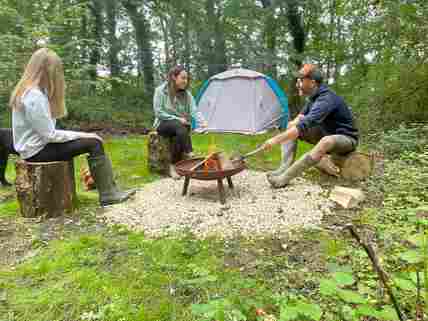 Spacious firepit area (4 man tent in image)