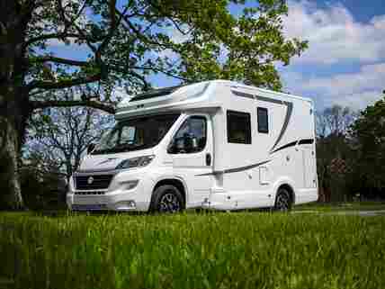 Motorhome on field pitch with EH