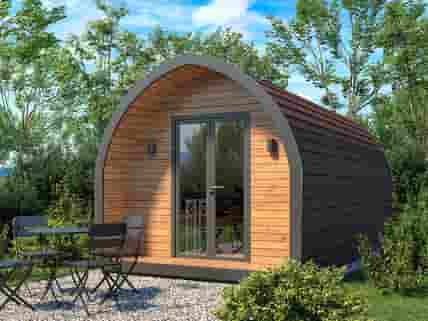 Glamping pod with outdoor seating area