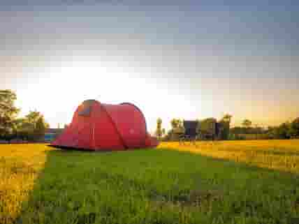 A tent pitched in the camping field