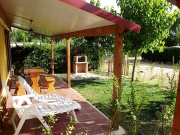 Outdoor furniture provided outside the cabin
