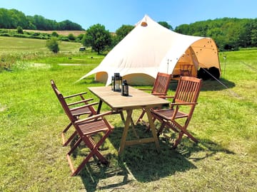 Bell tent with seating