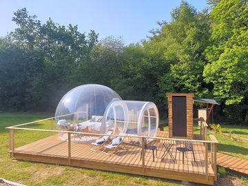 A completely transparent 'bubble' on a wooden deck (added by manager 28 Jun 2023)