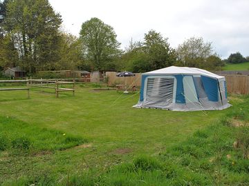 Pitch 22  four berth Rental Trailer Tent with fabulous country views.