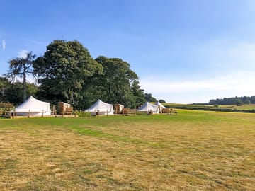 Bell tents in seven acres of fields