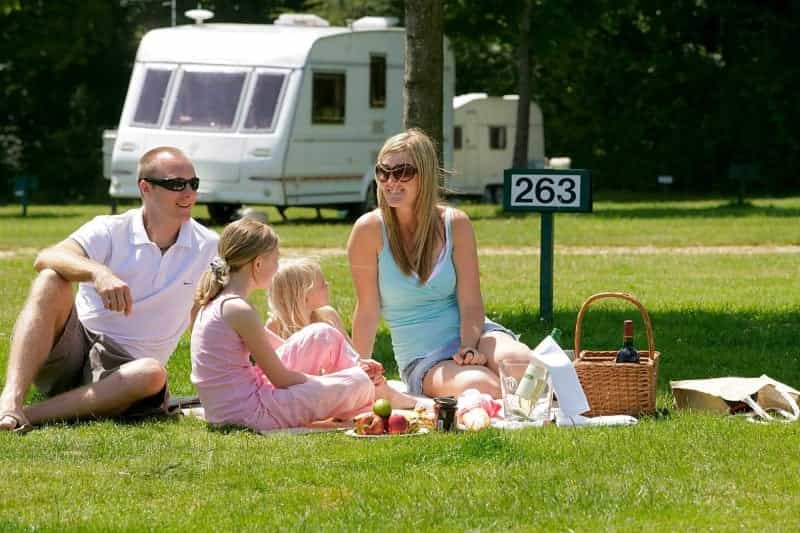 Family on a touring caravan pitch