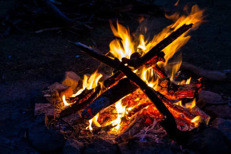 An example of the campfire teepee method (Photoholgic / Unsplash)