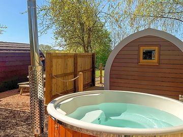 Hot tub outside each pod