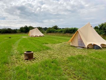 The bell tents and firepits