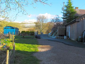 Blue shepherd hut and the bunk house (added by manager 07 mar 2023)