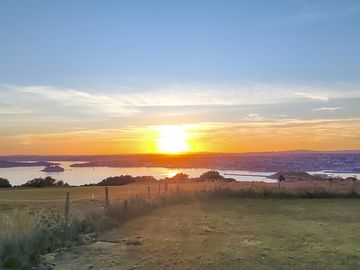 Visitor image of their view of the sunset from the site (added by manager 23 sep 2022)