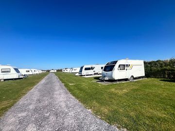 Fully-serviced hardstanding touring pitch