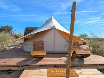 Terrace seating outside the bell tent