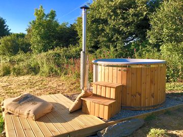 Your own private wood fired hot tub beside each glamping unit (added by manager 09 apr 2022)
