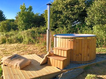 Your own private wood fired hot tub beside each glamping unit