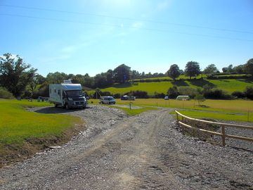 Electric pitches with camping pitch beyond