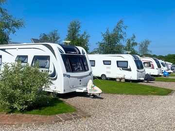 Electric optional grass and gravel touring pitches