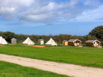 Looking at the bell tents and camping pods.