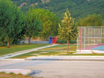 Site with a backdrop of forested hills