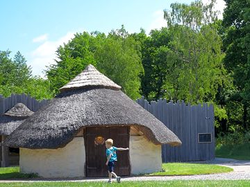The roundhouse backed by woodland
