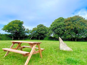 Picnic benches dotted around