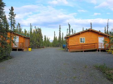 Cabins in woods with mountain views
