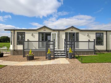 Lodge with parking, decking and private garden