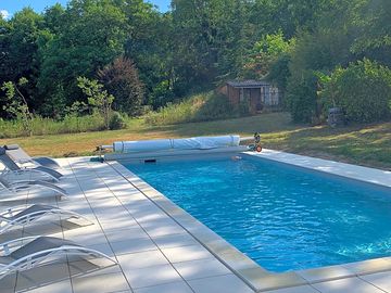 Pool with sunloungers