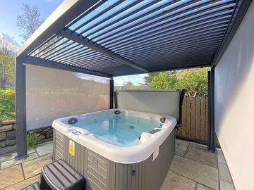 Private hot tub in an all-weather gazebo