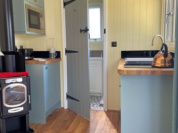 Kitchen area with woodburning stove (added by manager 13 oct 2021)
