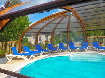 The retractable roof over the sun deck