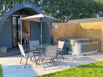 South-facing patio with hot tub