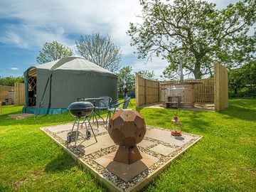 Outside area with firepit and barbecue