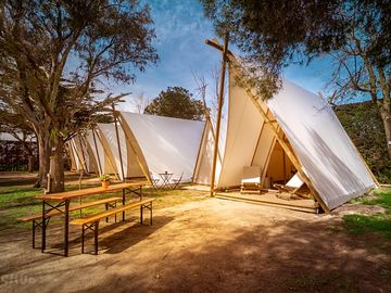 Row of tipis (added by manager 10 aug 2023)