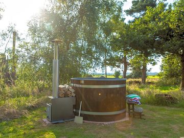 Each unit has its own 6-person hot tub that is heated for your arrival