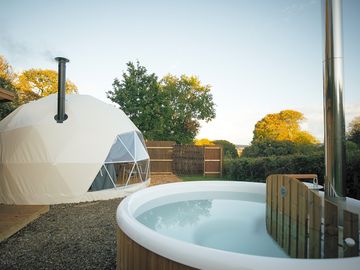 Each dome has a private hot tub