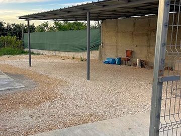 Covered gravel pitches
