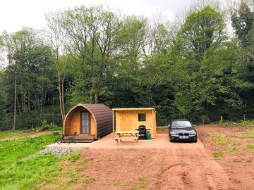 Front view of the pod and parking area