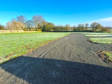 Level hardstanding pitches
