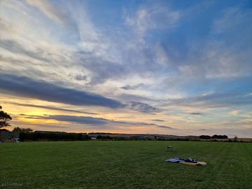 Evening sun over the camping field