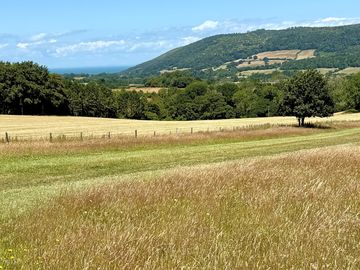 Stunning view across porlock vale campsite to the bristol channel and hurlestone point