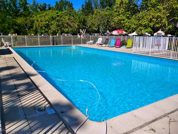 Outdoor pool and sun loungers