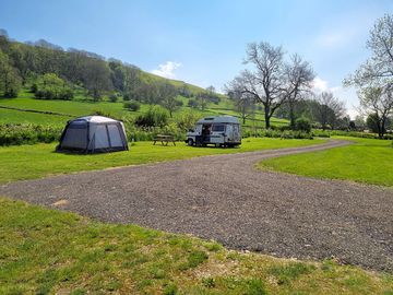 The gravel entrance road and first set of ehu pitches (added by manager 18 may 2024)