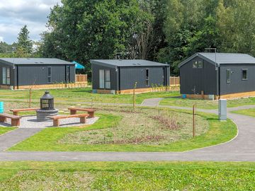 Superior glamping cabins and the communal fire pit