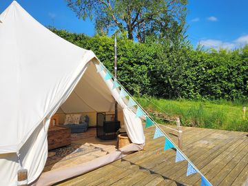 Bell tent with log burner